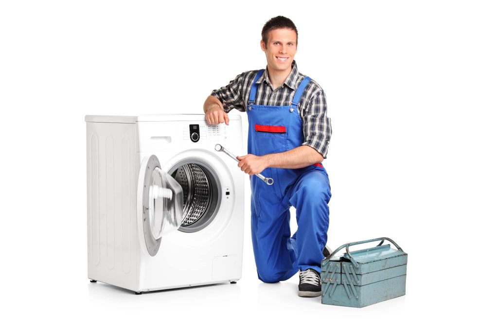 Technician inspecting a household washing machine